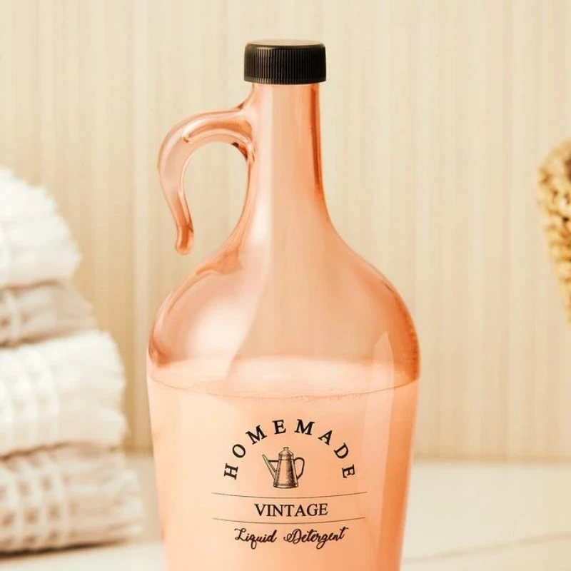 زجاجة منظف زجاج مود جالون عنبر من مدام كوكو - مدام كوكو
