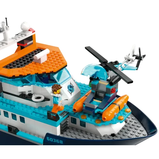 LEGO City قارب استكشاف الغوص 60377 - لعبة بناء بحرية، تحتوي على بيئة مرجانية، غواصة صغيرة، 3 شخصيات صغيرة، ومجسمات راي مانتا، سمكة قرش، سرطان، سمكتين، و2 سلحفاة - ليجو - Image 4