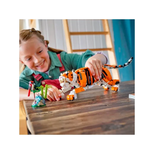 LEGO Creator 3 في 1 مجموعة بناء النمر الرائع، تتحول من نمر إلى باندا أو سمكة كوي، تماثيل حيوانات، لعبة بناء قابلة للجمع، هدايا للأطفال، للأولاد والبنات من عمر 9 سنوات فما فوق، 31129 من ليغو - ليجو - Image 2