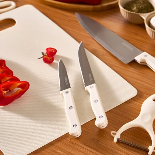 طقم سكاكين كاراجا Sharp 4 in 1 كريم 6 قطع مع لوح تقطيع ومقص ومقشرة – أدوات مطبخ من فولاذ 2Cr13N لتحضير الطعام بسهولة - كراجا - Image 2