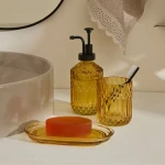 طقم إكسسوارات حمام كاراجا هوم بيلينو 3 قطع لون أمبر، حامل فرشاة أسنان وصابون سائل وقطعة صابون بتصميم أنيق وعصري - كراجا