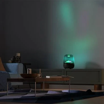 هارمان كاردون Aura Studio 4 سماعة منزلية لاسلكية بتقنية Bluetooth، صوت 360 درجة، إضاءة محيطية بنمط ماسي، تصميم شفاف، أسود - هارمان كاردون - Image 2