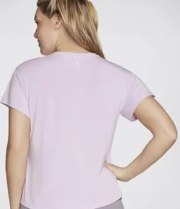 Skechers Women's Go Dri Swift Tunic Tee in Pink Slate, Large, featuring moisture-wicking and quick-drying GO DRI SWIFT fabric, perfect for yoga and weekends. SKU: TS63-BLK - Skechers - Image 3