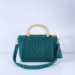 A charming "teal" color crochet handbag