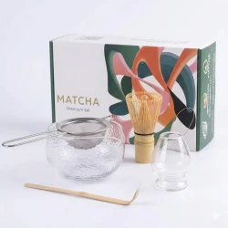 Matcha Kit Glass Set 5 Pcs with elegant transparent design, includes a glass bowl, bamboo whisk, bamboo scoop, and whisk holder. Easy to use, beginner-friendly, and perfect for traditional matcha preparation Comes with a box