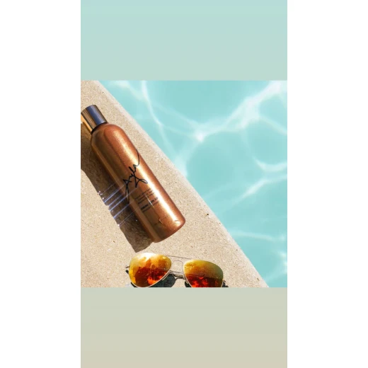 Ayla Shimmery golden Tanning Oil - GIMME SUN LOVE-CARROT OIL, SWEET ALMOND OIL AND VITAMIN E, WITH THE PERFECT GOLDEN SHIMMER - 240 ML / 8 FL OZ - Ayla Naturals - Image 2