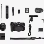 كاميرا Canon EOS R50 V مع عدسة RF-S 14-30 مم PZ، كاميرا ميرورلس مدمجة مخصصة لصناع المحتوى، تقدم تصوير عالي الجودة، فيديو وصور واضحة، عدسة واسعة بزوم، تركيز سريع، وتصميم خفيف مناسب للفلوغ والسوشيال ميديا - كانون